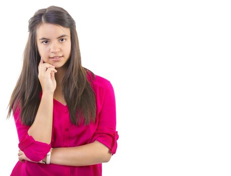 beautiful teenage girl smiling and looking into the camera hand under her chin isolated on white