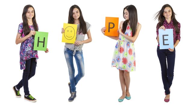 Teenager girl showing the text hope on paper