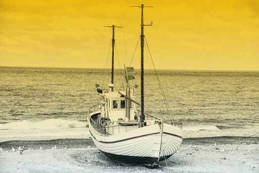 Fishing boat on the beach in Denmark