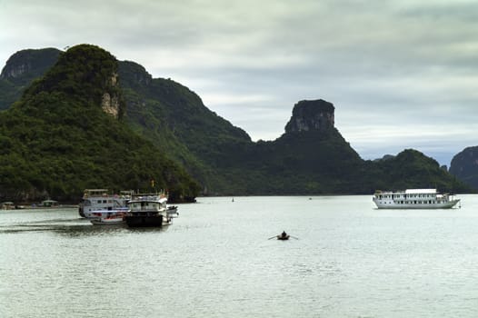 Morning, Boats and Rocks in Ha Long Bay, Vietnam.