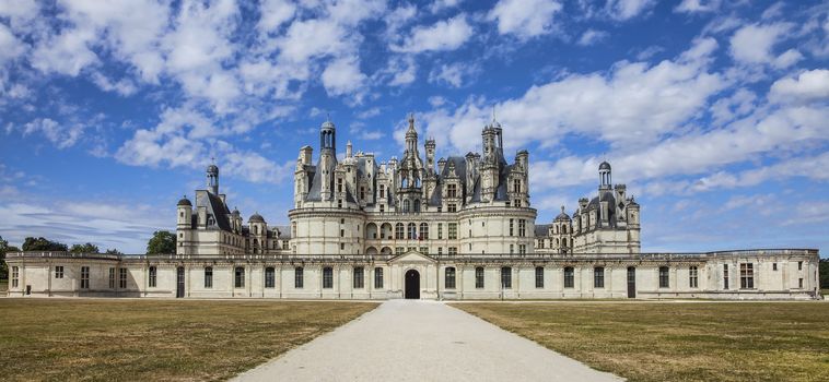 Image of the famous Chambord Castle located in the Loire Valley, in a beautiful summer day.