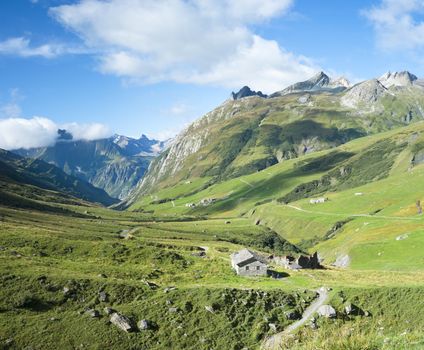 VILLE DES GLACIERS, FRANCE - AUGUST 27: Composite of Glaciers Village with chalets. The region is a stage at the Mont Blanc tour, which crosses three countries. August 27, 2014 in Ville des Glaciers.