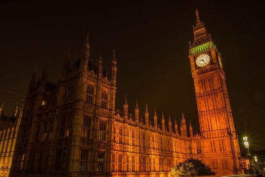 NIght view on London most famous landmark Big Ben and Parliament House on river Thames