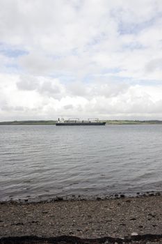 cargo ship with windmill parts on its journey through Youghal harbour county Cork Ireland