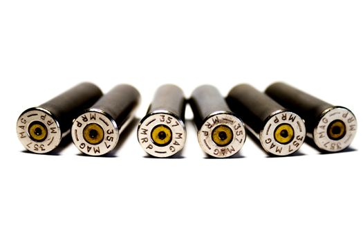 Six cartridge cases, caliber 357 Magnum fired, firing pin impression, high contrast