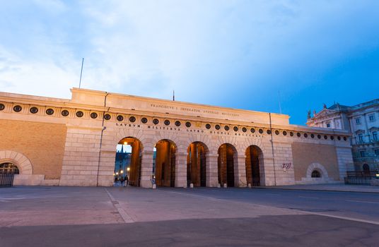 VIENNA, AUSTRIA - AUGUST 4, 2013: Auseres Burgtor Gate monument at night in Vienna, Austria