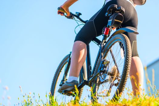 Bike and foot athlete closeup