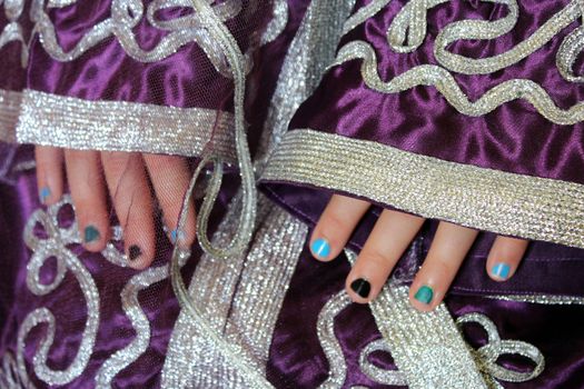 girl's hands in Moroccan very nice suit