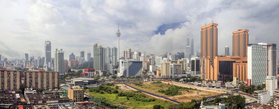 Kuala Lumpur Malaysia Central Cityscape with Old Neighborhood Houses Against Cloudy Blue Sky Panorama
