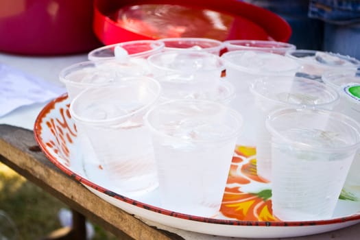 Soft drinks in plastic cups