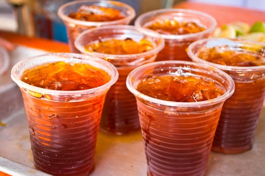 Soft drinks in plastic cups