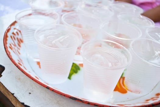 Soft drinks in plastic cups