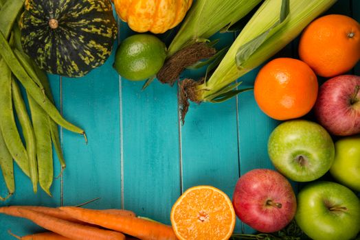 Farm fresh organic vegetables on rustic wooden blue table background