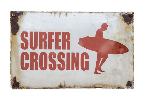 Grungy Retro Vintage Surfer Crossing Sign At A Road Crossing By A Beach