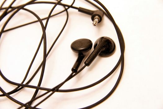 Black headphones isolated on the white background