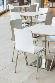 tables and chairs sets in restaurant