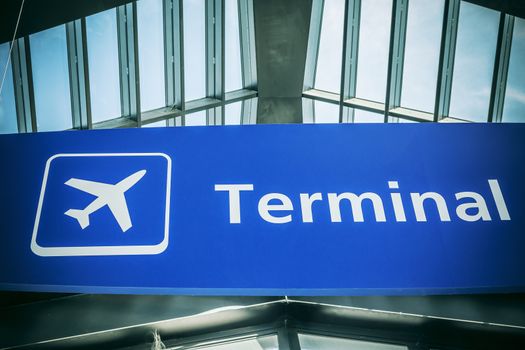 Informational sign showing terminal at international airport