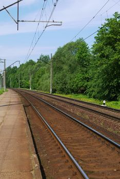 Line of railway passing forest of Latviain