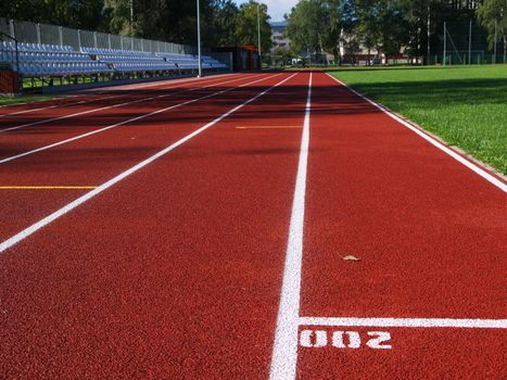 Red racetrack on the stadium in Riga