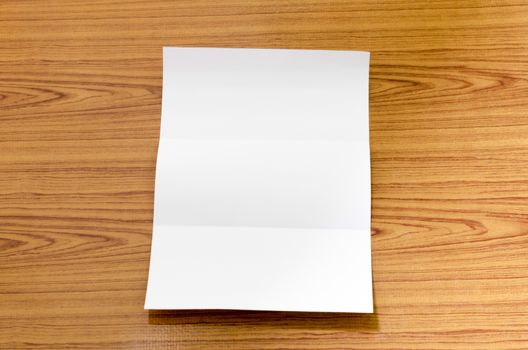 paper on wood background