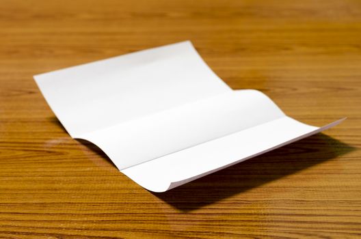 paper on wood background
