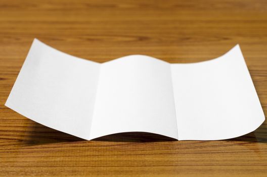 paper on wood background