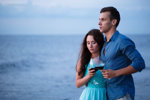 Summer, sea. Cute, lovely couple on the beach