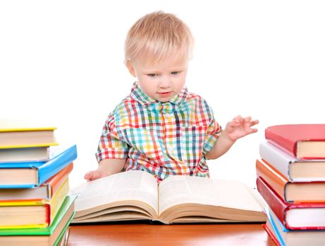 Baby Boy with the Books at the Desk Isolated on the White Background