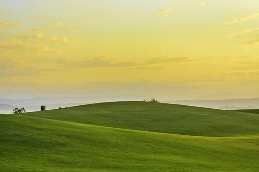 Golden sunrise on golf greens, Philippines