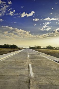 Newly built concrete road leading to a resort, Philippines