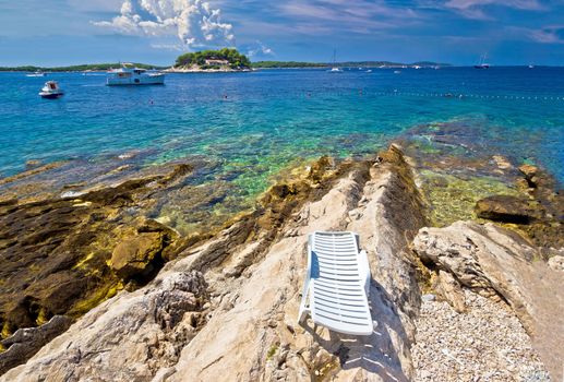 Stone beach of Island Hvar with Paklinski island yachting destination view, Dalmatia, Croatia