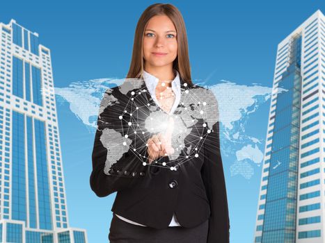 Beautiful businesswoman in suit presses finger virtual sphere. Buildings as backdrop