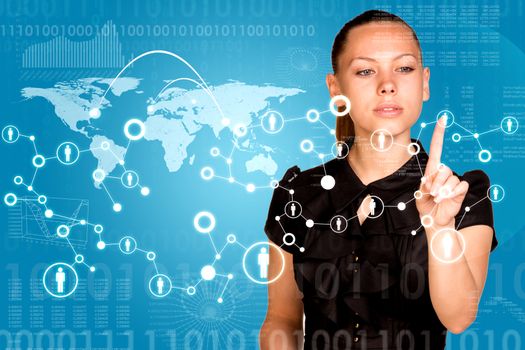 Beautiful businesswoman in dress presses finger virtual network contact. World map with graphs as backdrop