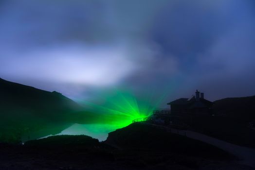 the play of light in a dolomites mountain lodge, Trentino - Italy