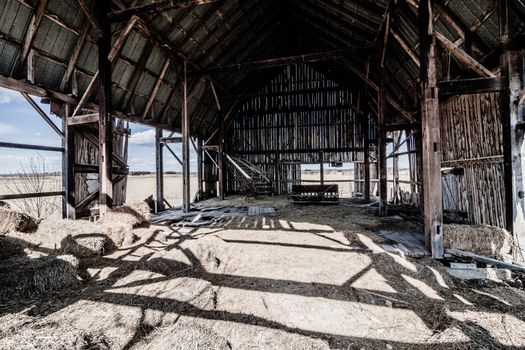 Old Abandoned Barn and Haystack and destroyed walls