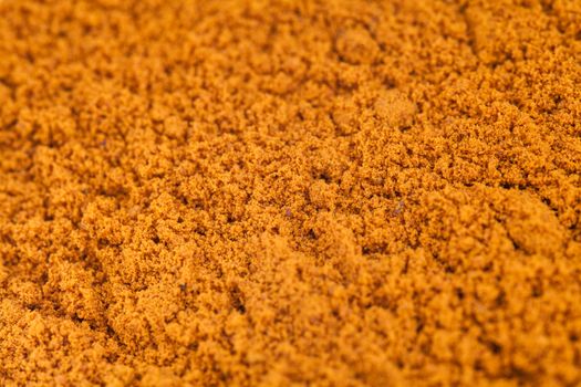 Extreme Closeup of Turmeric Powder Macro Texture