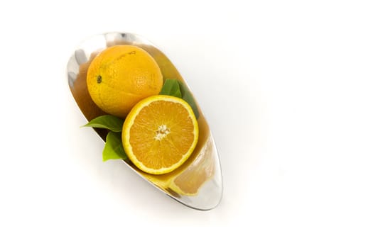 Oranges, Organic Vitamin C in a silver bowl