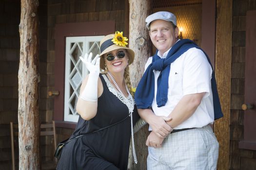 Young Attractive Couple Dressed in Outfits from the Twenties Era.