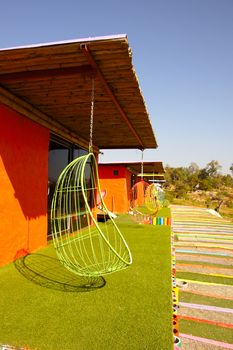 Green hanging chair.