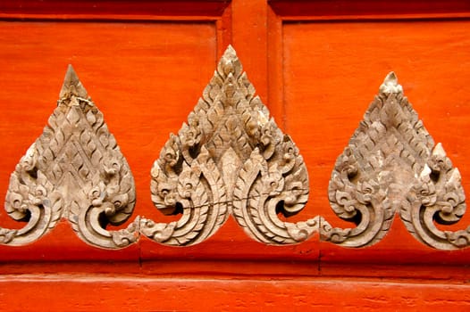 Wood carving, more than 200 years old, remains in the country.