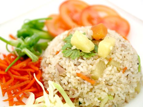 Rice with tuna fish and fruits.