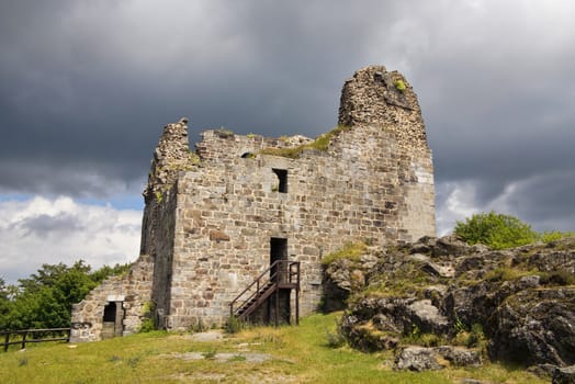 Primda castle - the one from the oldest stone castles in Czech republic.
The first mention of Primda castle dates from the year 1121.
The ruins of the castle Primda stands at the southern end of the rocky ridge above the Primda village on Tachov Region. Primda is considered to be the oldest surviving stone castle in Bohemia and is protected as a national monument. The castle has been preserved ruins of a massive rectangular Romanesque residential tower, which was built of quarried stone. Also there are remains of a cylindrical tower from the late 15th century.
Primda, Czech republic.
