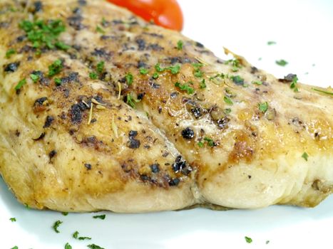 Fish steak with black pepper.