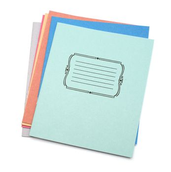 multicolored exercise books over the white background