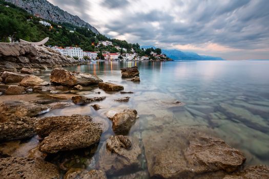 Rocky Beach and Small Village near Omis in the Morning, Dalmatia, Croatia