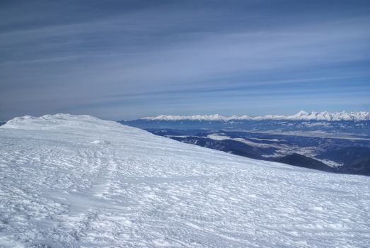 Picturesque view of Kralova hola Mountain in Low Tatras covered in snow, Slovakia                  