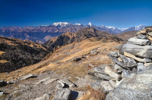 Picturesque view of rocks and peaks in Kuari Pass in India