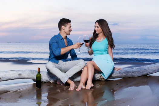 Summer, sea. Cute, lovely couple on the beach