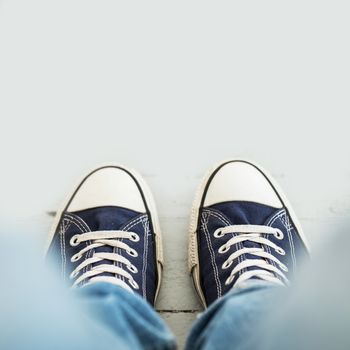 Classic sneakers on the floor