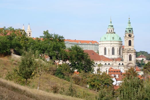 Photo is showing various views onto the Prague castle and its gardens in the spring time.